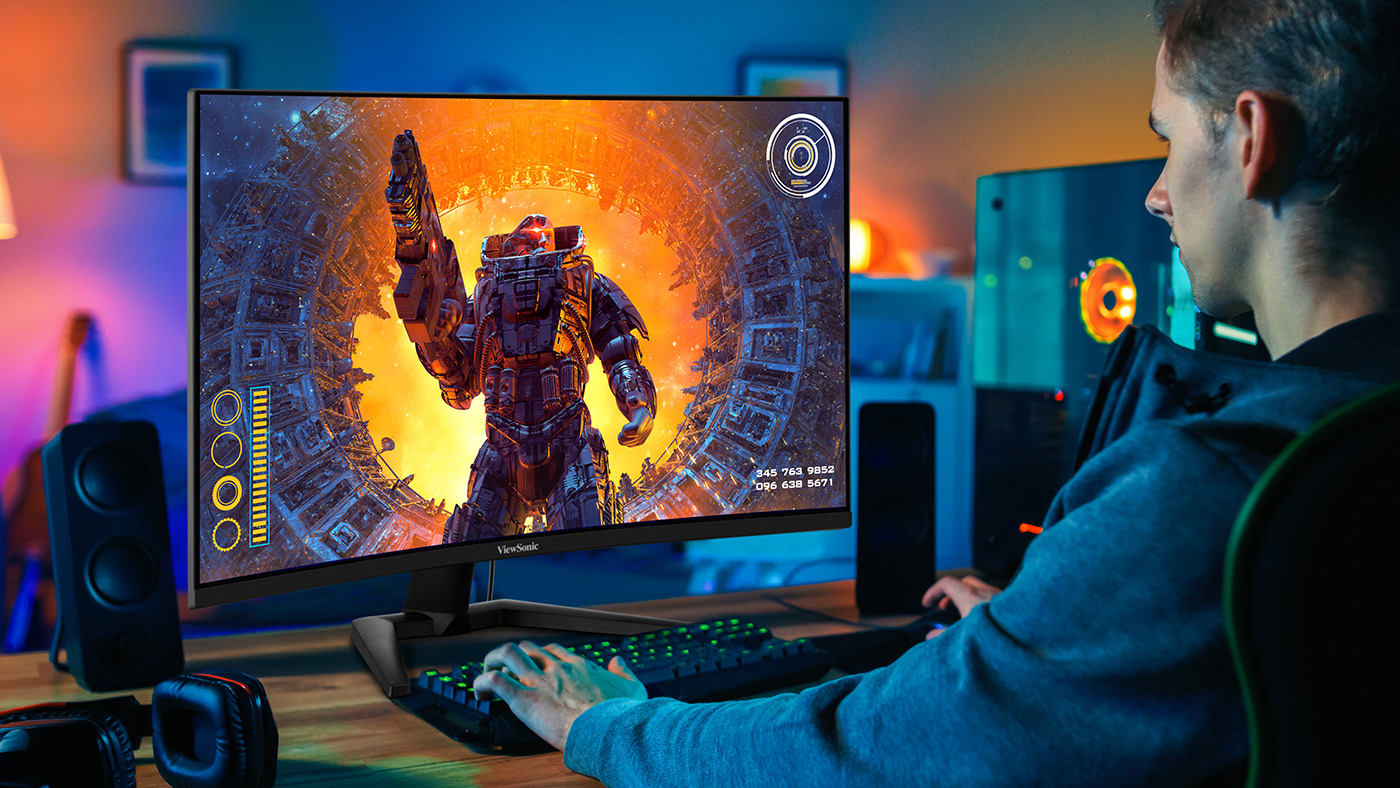 Gamer playing a FPS on a curved screen