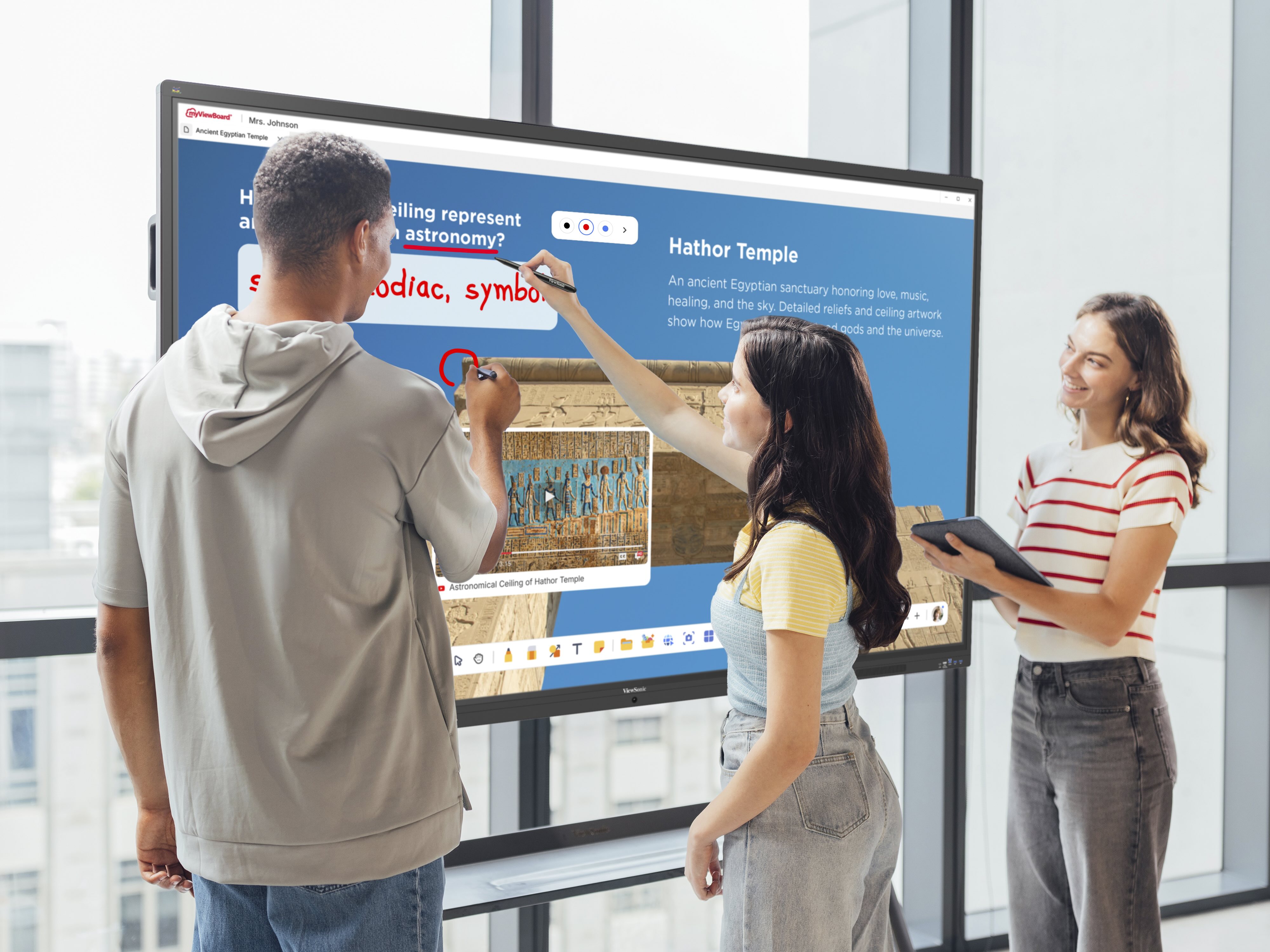 Teacher and students using ViewBoard IFP41-1 Series interactive whiteboard by ViewSonic.