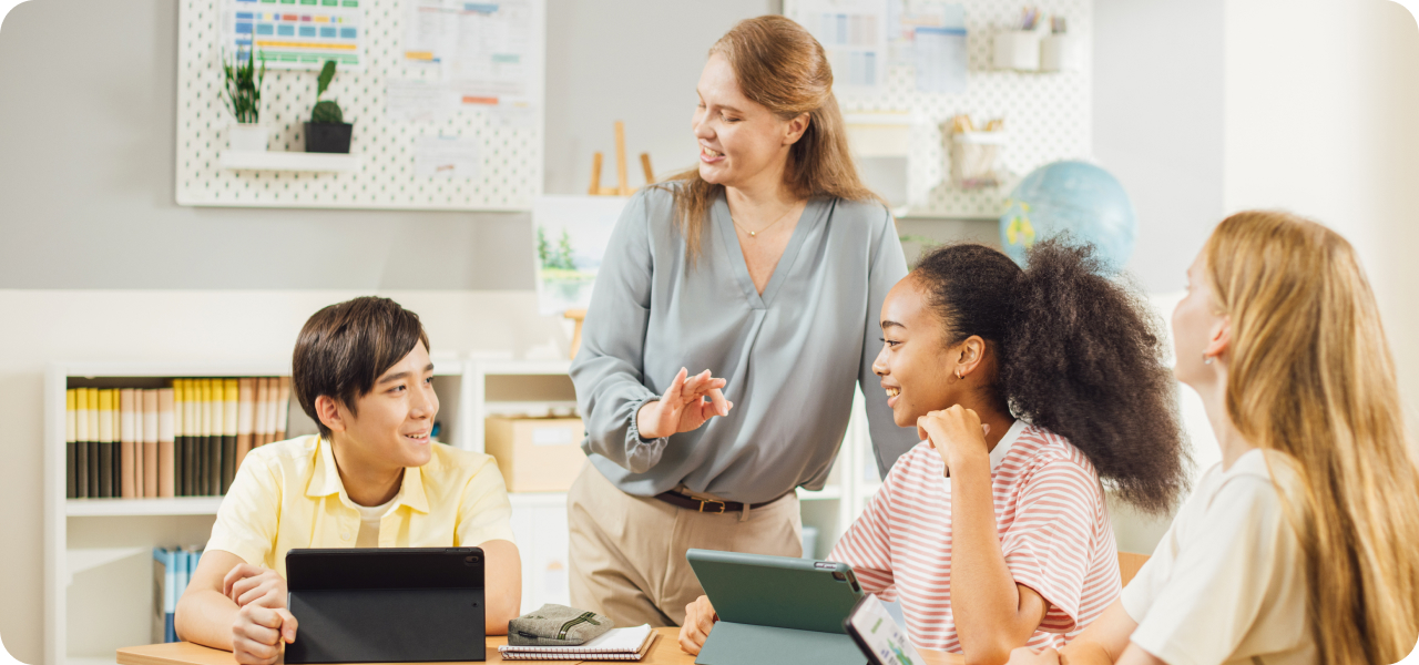 Teacher interacting with students.