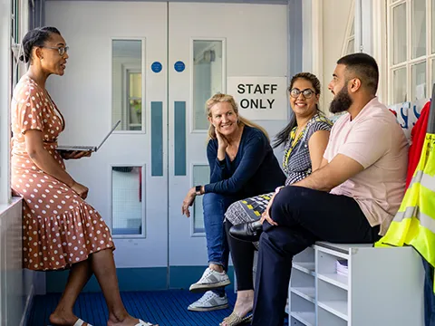a group of teachers communing