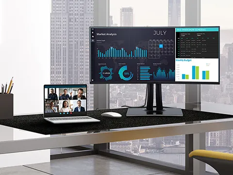 graphs on a monitor connected to a laptop