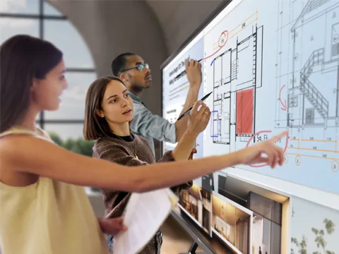 IT using a laptop to manage multiple ViewBoards