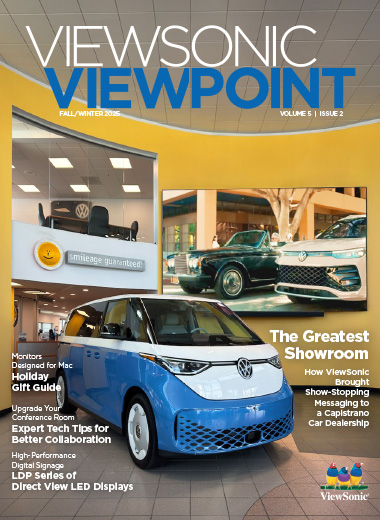 a large screen in a car dealership