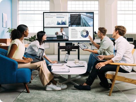 a large screen on the wall of a lobby