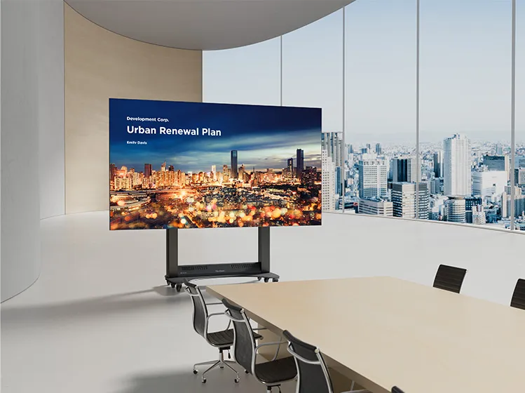 people working in an open-floorplan office