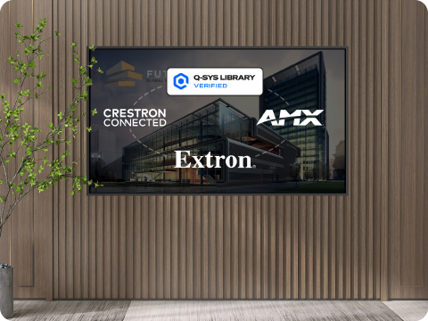 two screens on the wall of a conference room