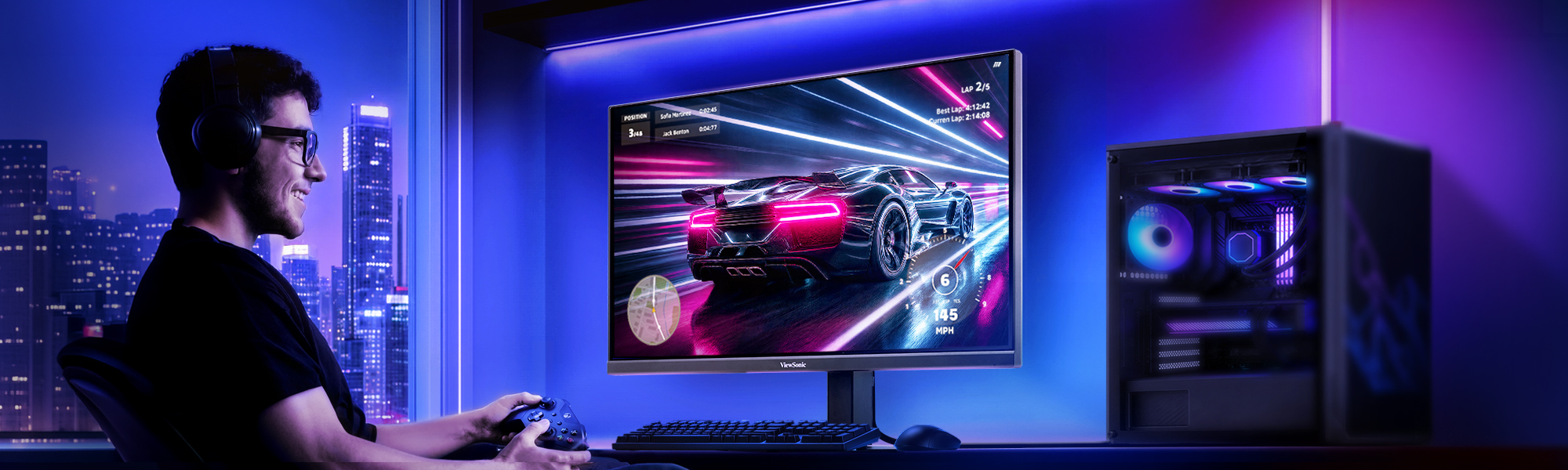 someone sitting at a desk playing a computer game