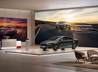 two large displays in a car showroom