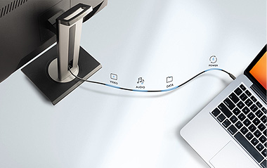 USB-C cable from ViewSonic monitor powering a laptop