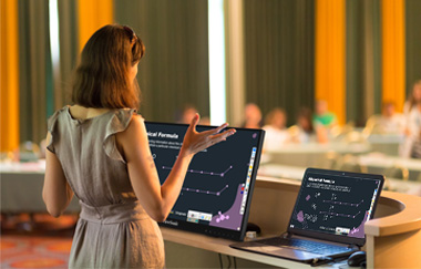 Woman using ViewSonic ID2456 while presenting to a large room