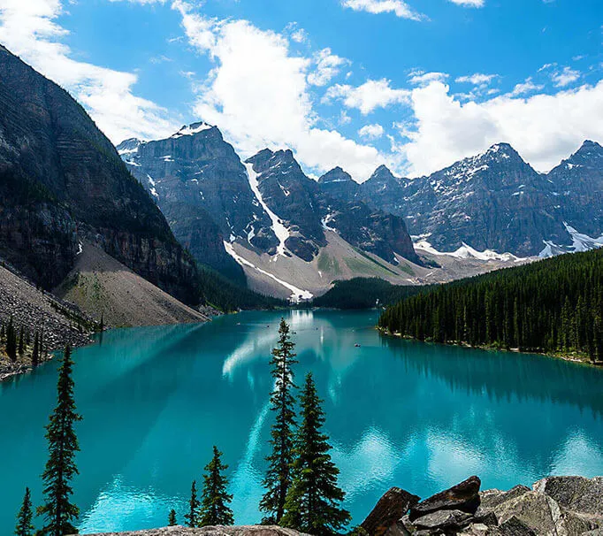 snowy mountains, and a lake
