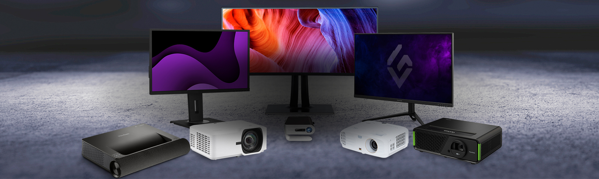 an array of monitors and projectors