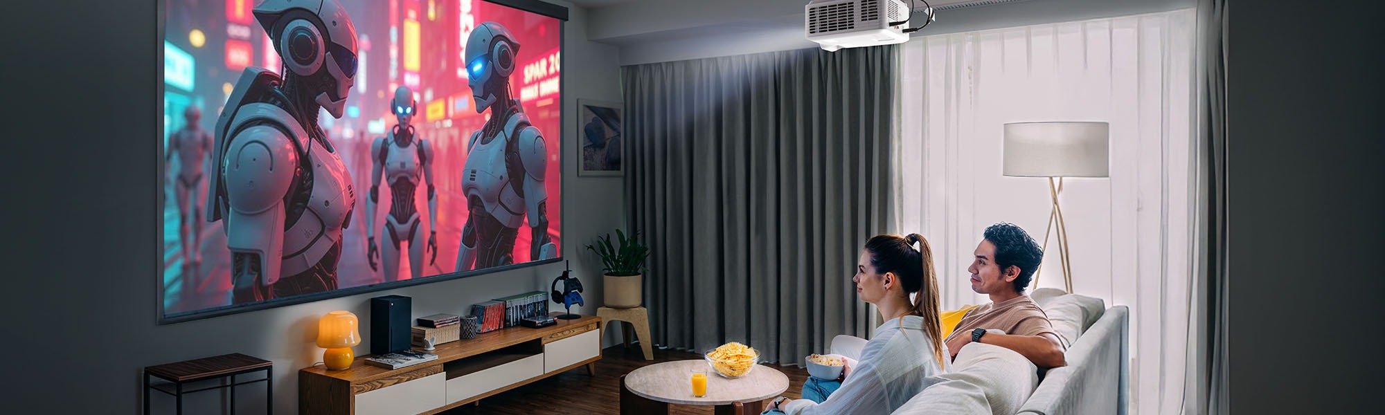 a woman uses graphic design software on two monitors